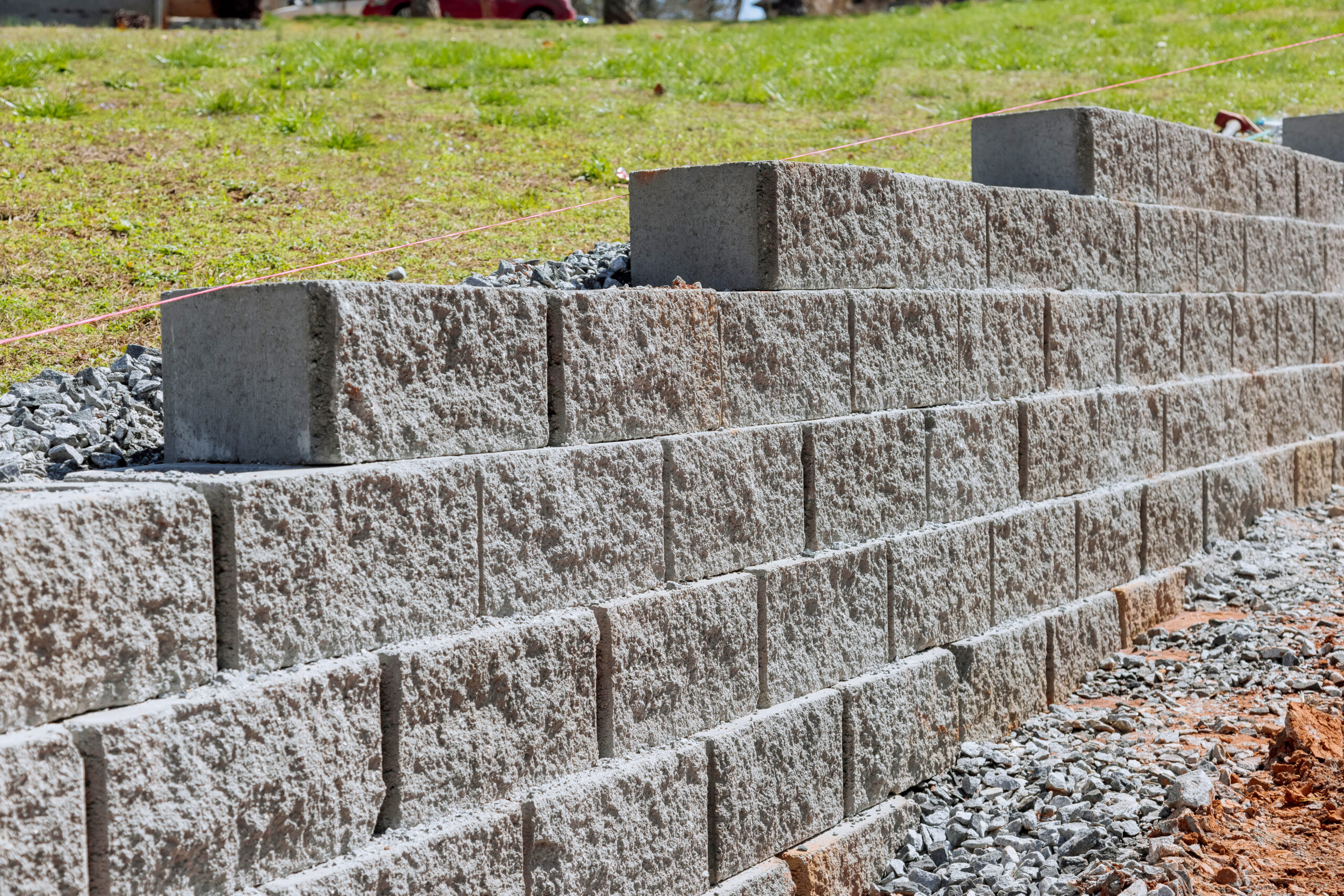 A retaining wall is being built as part of construction of a new home near a property where the wall is to be built Buttrose Retaining wall